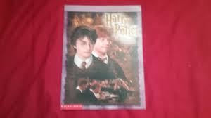The mysteriously gleaming foot high wordson the wall proclaim: Harry Potter And The Chamber Of Secrets Poster Book By Warner Bros Good Soft Cover 2002 1st Betty Mittendorf Tiffany Power Bkslinen