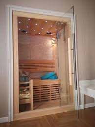 A sofa, a cushion, a television, an armchair, a. Sauna Junior Suite Spa By Des Anglais Sanremo Sonderangebote