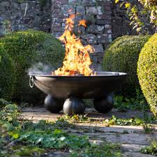 Garden fire balls are the latest way to extend your evenings in the summer! Fire Pits Indian Fire Bowls Outdoor Kitchens Pizza Ovens