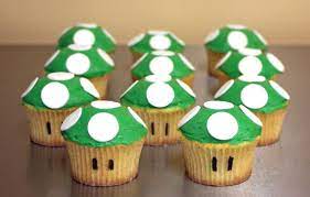 Power up with these cute mushrooms that are super easy and quick to make! Super Mario Cupcakes Around The World In 80 Cakes Super Mario Cupcakes Super Mario Birthday Party Mario Bros Cake