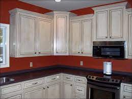 The gray walls, wood island, and the glass mosaic tiles used as a blacksplash make for. Pin On Kitchen