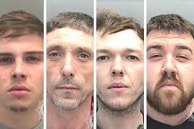 Armed and masked gang bundled man into car and drove him to remote hillside 