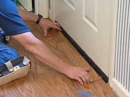 Vinyl has a longer lifespan and better overall durability than laminate. Laminate Flooring Installation Undercutting Door Frames Airbase Carpet And Tile Youtube