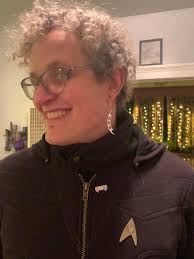 Bella Donna bought me Bat'leth earrings and an antifa combadge!