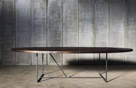 Heavier metal legs—such as our industrial metal tapered legs—are good for larger, heavier tables. This Oval Dining Table W Is Made Of Brushed Metal For The Structure And Solid Reclaimed Charcoal Black For The Top