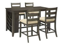 At the moment i'm using a dining table that's 36 x 96 (91 x 244cm) that can seat 8 in reasonable comfort with. Rokane Counter Height Dining Room Table Ashley Furniture Homestore Independently Owned And Operated By Bedscape Corp
