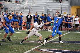 NEW-LOOK LIONS: St. Helens football, 13 seniors can hit the ground running  against Hood River Valley