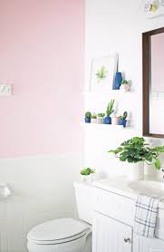 Choosing a vivid color for the walls and ceiling really makes the subway tile backsplash, artwork and fixtures pop. Pink Bathroom Makeover Pretty Providence