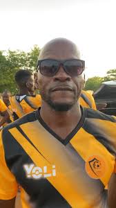 Fare Thee Well Cimmie Ookame, In the fields of Mfowangina, where dreams  took flight,You danced with the ball, a beacon of light.Three decades of  passion, a heart full of cheer,In the village of Thini, ...