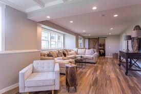 2 set up extra seating behind the couches. Modern Farmhouse Basement Remodel Before After Ideas