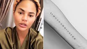And now on her wrist too. Chrissy Teigen Comes Under Fire For Tattoo S Holocaust Vibes Metro News