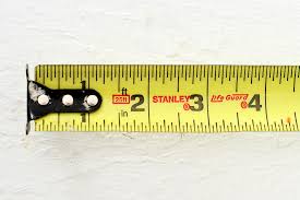 The smaller numbers in red correspond to feet plus inches, so 18 inches (in black) is the same as 1 foot 6 inches, and so on. How To Read A Tape Measure Apartment Therapy