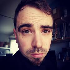 Ideas for a transition between uneven basement floors?