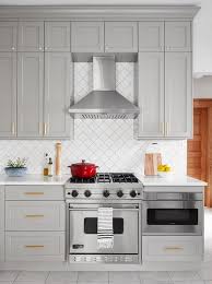 Consider mingling other colors in this series to add a little pop to your project! White Arabesque Kitchen Backsplash Tiles With Gray Grout Design Ideas