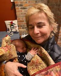 Dr Melhuish meeting grandson, Iver.