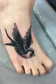 I have a tattoo across the top of my foot; Tattoo Uploaded By Ben Brodie Nice Coverup Sparrow On The Foot 1196609 Tattoodo