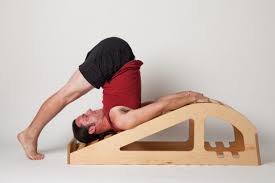 Halasana On Iyengar Yoga Prop Vipariti Dandasana Bench Iyengar Yoga Yoga Props Iyengar Yoga Poses