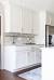 Shaker White Cabinets With Bronze Hardware