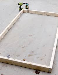 Once the bed platform is ready paint it and move it to the storage panel, assemble the storage label and secure them tightly with screws. Diy Twin Platform Bed