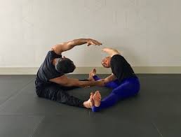 10 Partner Yoga Poses For A Strong And Flexible Relationship Partner Yoga Poses Partner Yoga Couples Yoga