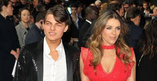 Wearing @versace @donatella_versace 🖤 • follow their account to see 210 posts. Elizabeth Hurley Shuts Down Reality Show Rumors By Posing Nude