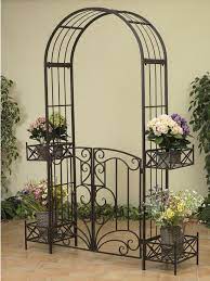 A wide variety of gated garden arch options are available to you, such as feature, plastic type our garden arch is made of aluminum alloy which is light weight, eco friendly and recyclable, the following detailed spec. Garden Metal Arbor With Gates And Planters Garden Arch Metal Arbor Metal Garden Arch