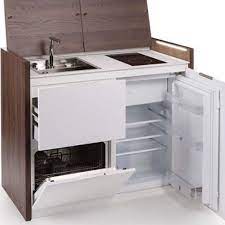 Maybe you would like to learn more about one of these? Compact All In One Kitchen Unit Hides Stove Fridge And Dishwasher Video