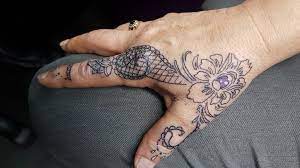 Chic gothic cross thigh tattoos. The Tattoo Den Jewellery And Lace Style Hand Tattoo Facebook