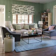 Blue velvet tufted sofa and crystal chandelier Grey And Green Living Room Ideas That Are Neutral And Pure Sitting Room Decor Living Room Decor Themes Living Room Green