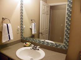 Creating a mosaic tile mirror. Saved By Suzy Tile Mirror Tutorial Bathroom Mirrors Diy Mirror Frame Diy Bathroom Mirror Frame