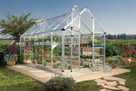 Outsunny 7' x 7' x 7' pop up garden greenhouse with arc side door, carry bag, & unique portable design for vegetables. The 4 Best Greenhouses Of 2021