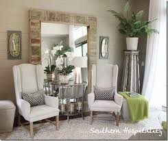 Love This Huge Mirror Leaning Against The Wall With Two Chairs And A Table Grouped In Front Of It By Twila Living Room Pictures Living Room Mirrors Home