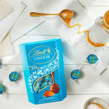 Sink into the sublime and enjoy a magnificent moment of bliss with our luxurious lindor chocolate; The Lindor Truffle Lindt Sprungli