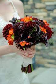 Oct 14, 2020 · pair cranberry with burgundy or black for plenty of contrast, or work it in as a splash of color with a neutral scheme. Wedding Bouquet Orange Freesia Purple Black Calla Lilies Dahlias And Purple Fiddle Heads A Black Calla Lily Orange Wedding Flowers Orange Wedding Bouquet