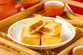Pineapple cake is a sweet traditional taiwanese pastry containing butter, flour, egg, sugar, and pineapple jam or slices. Taiwan Traditional Dessert Experience Pineapple Pastry With Egg Yolk Longan Cake High Mountain Oolong Tea 2021 Taipei