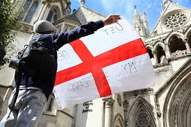 Flag row: This is our England — and we can display the St George's cross wherever  we bloody well want to