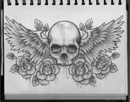 Skull Wings And Roses Tattoo Design Chest Tattoos For Women Skull Tattoos Skull Tattoo Design