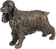This sculpture has the dimensions of 50 x 30 x 33 cm, the sculpture is sculpted from a medium of 'bronze'. Cocker Spaniel Standing Bronze Dog Sculpture 18 Cm Bronze Gifts
