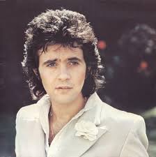 David Essex David Essex OBE is an English singer-songwriter and actor. From  1973 to 1994, he attained 19 Top 40 singles in the UK and 16 Top 40 albums.  Internationally, Essex had