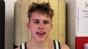 Hudson Falls' Justin Mullis talks after winning at 131