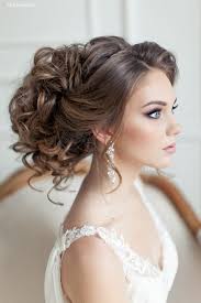 This wedding updo for long hair is all about highlighting your texture and framing your face for a stunning result. 15 Cool Suggestions Of Modern Wedding Hairstyles Romantic Wedding Hair Hair Styles Elegant Wedding Hair