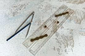 parallel ruler on nautical chart stock photo arnphoto