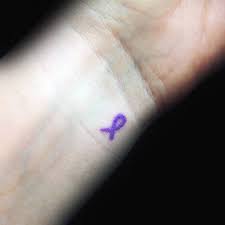 Ribbon tattoos are versatile pieces of art that can be used to carry different ideas. 69 Best Cancer Ribbon Tattoos Designs And Ideas Collection Segerios Com