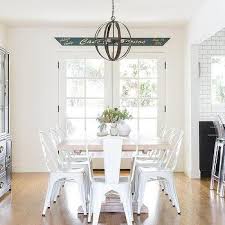 Get the free traffic flow of an open plan and the intimacy of a closed dining room by using sliding pocket doors. Dining Room French Doors Design Ideas