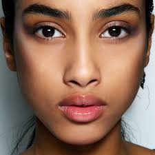 Intrinsic aging happens naturally over time and is determined by a person's genetics. The Best Anti Aging Tools And Treatments For Dark Skin