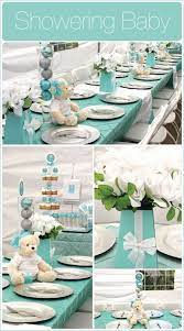 This adorable baby & co. Love Using The Blue Boxes As Flower Vases Even The Teddy Bear Is Super Cute Baby Boy Shower Teal Baby Showers Blue Baby Shower
