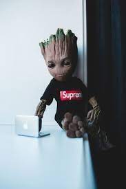 Boy In Brown Jacket With Green Paint On Face Photo Free Road Image On Unsplash Baby Groot Marvel Comics Wallpaper Groot Marvel