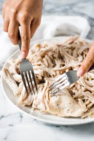 Most people will probably then put the chicken in a pot, cover with water, add salt and pepper if we're lucky, and then proceed to boil it until done. Easy Shredded Chicken Recipe Isabel Eats Easy Mexican Recipes