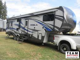 Maybe you would like to learn more about one of these? 2015 Evergreen Tesla T3212 5th Wheel 38 Toy Hauler 21db Team Auctions