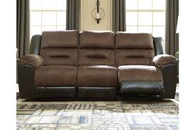 A lot of the terrible ashley reviews i'm reading seem to be about bonded leather couches and their hard furniture. Earhart Manual Reclining Sofa Ashley Furniture Homestore